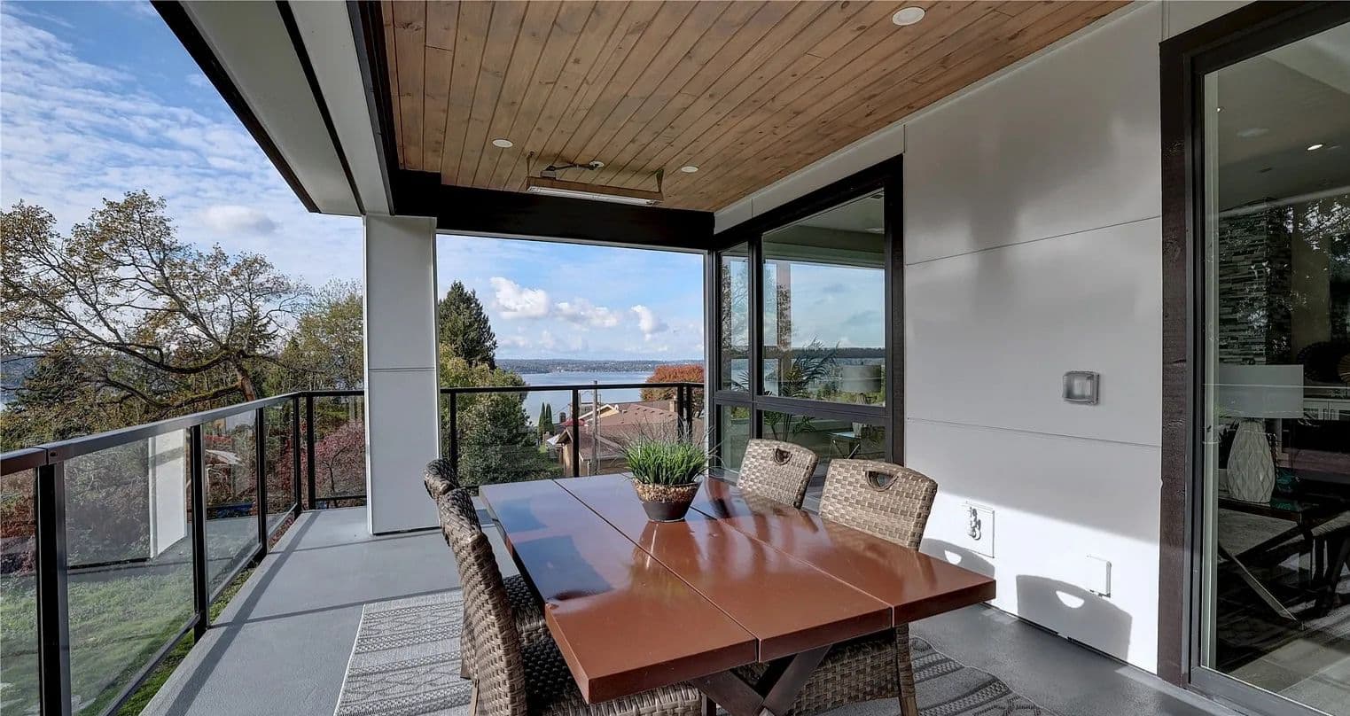 Covered outdoor dining deck with a view