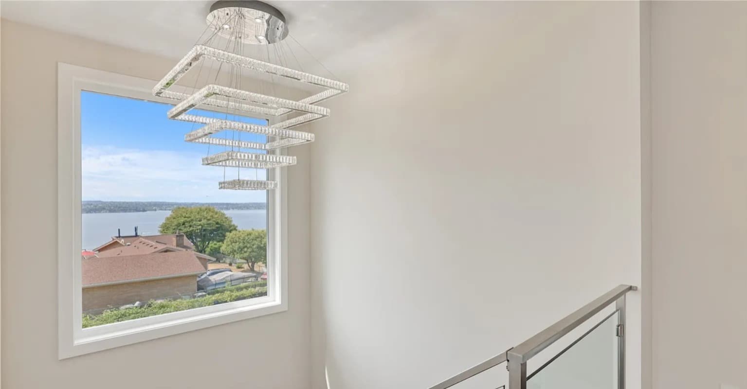 Upper loft with chandelier and water view